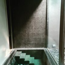 a black tiled custom spa